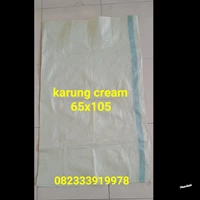 cream plastic sack 65x105 D600 Surabaya